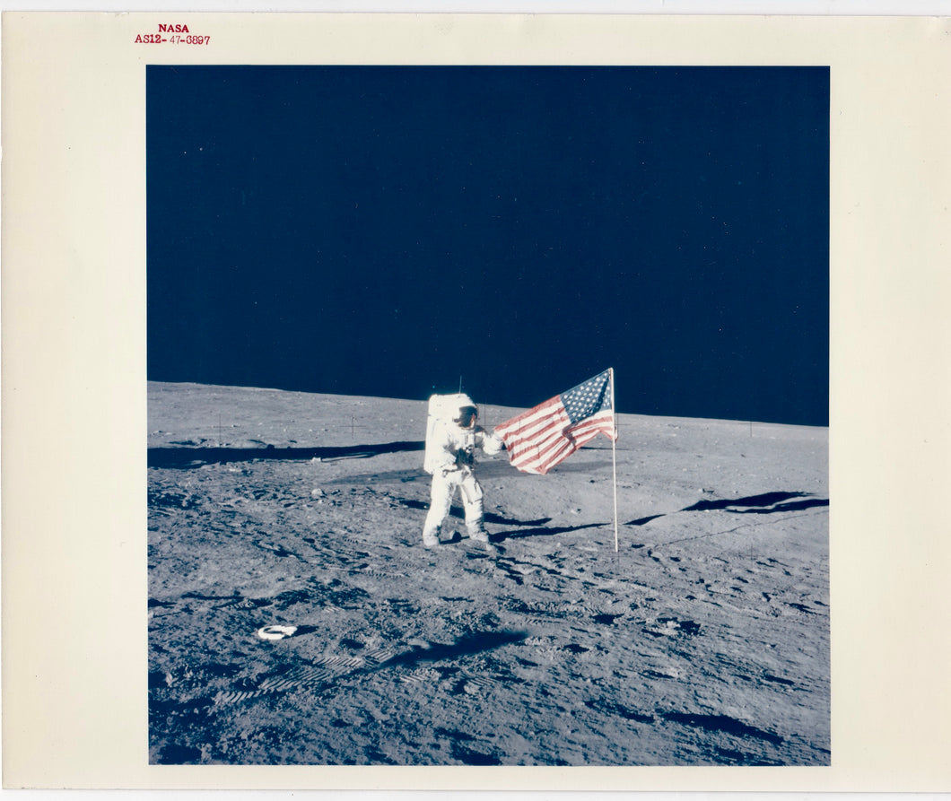 NASA Apollo 12, Astronaut Pete Conrad Jr Photographed with Flag on the Moon 1960s
