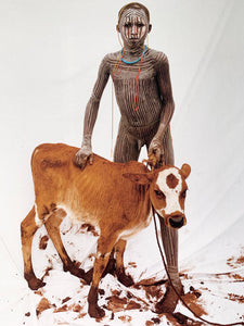 Boy with Calf by Jean-Michel Voge, A Tribal Child from the Omo Valley Ethiopia, Africa 1990s