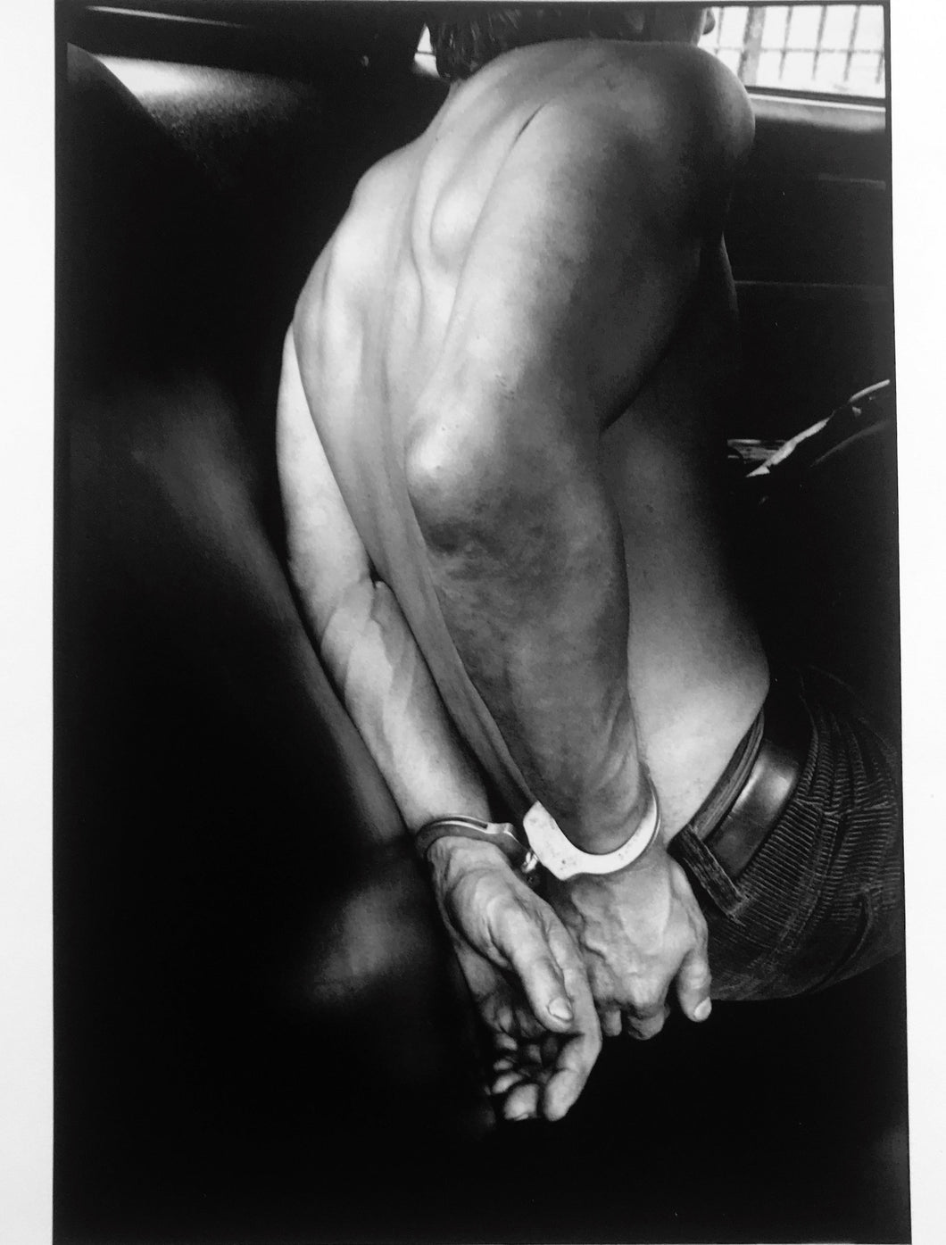 Handcuffed, New York City, Black & White Documentary Photography 1970s by Leonard Freed