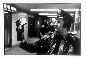 Policeman with Puppet and Gun, Black and White Limited Edition Photograph by Leonard Freed, Police Series Photographs 1970s
