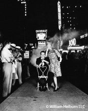 Load image into Gallery viewer, Paul Newman and Joanne Woodward Times Square, Black and White Celebrity Portrait Photograph by William Helburn
