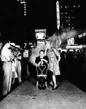 Load image into Gallery viewer, Paul Newman and Joanne Woodward Times Square, Black and White Celebrity Portrait Photograph by William Helburn
