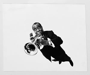 Louis Armstrong  by Philippe Halsman, Black-and-White Portrait Photography of African American Jazz Musician 1960s